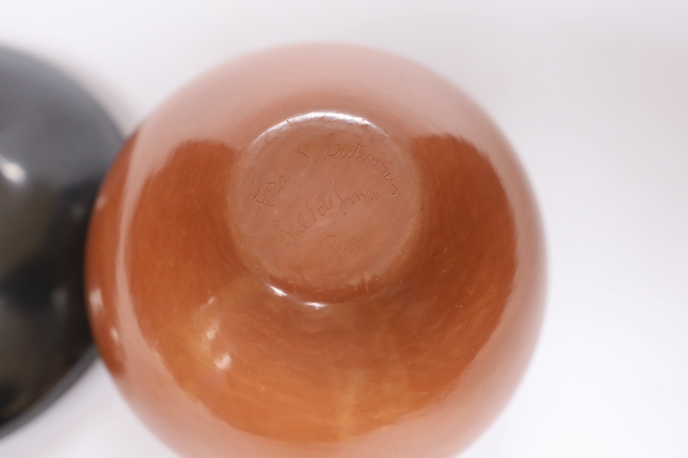 Two North American studio pottery vessels; a Marvin and Frances Martinez pottery bowl and a Kathy Gutierrez burnished bowl, tallest 10cm